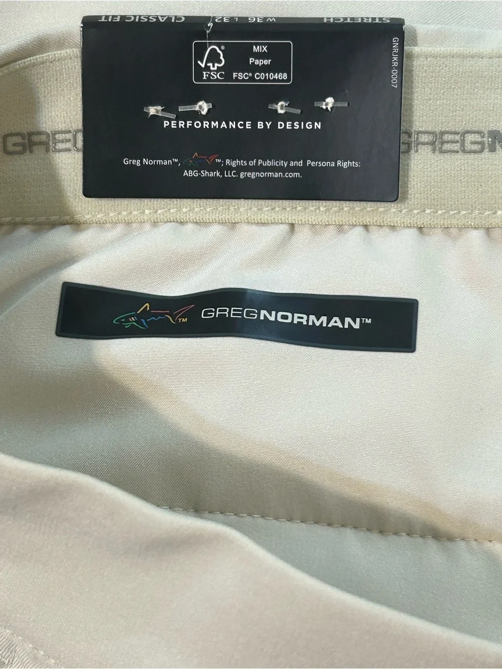 NWT- GREG NORMAN CLUBHOUSE PANT NATURAL PERFORMANCE